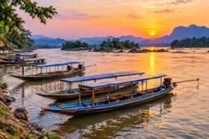 wooden boats among the islands of Si Phan Don, southern Laos
